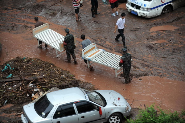 Floods pummel quake-hit county