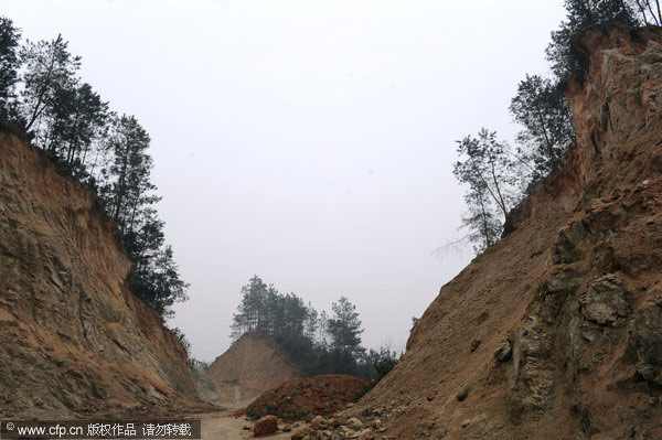 Overexploitation of sand erodes hills of C China