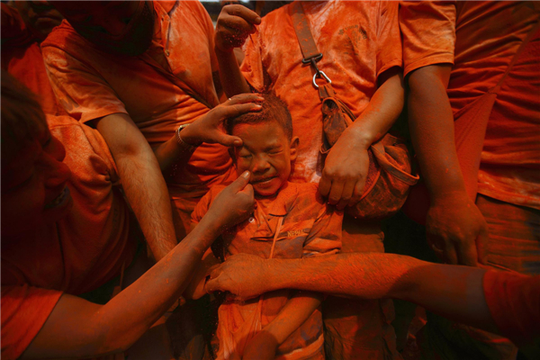 Nepalese celebrate vermillion powder festival