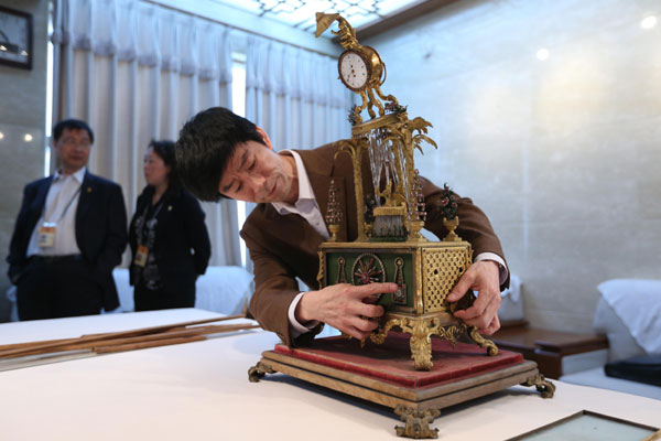 Museum antique clock damaged by vandalized window