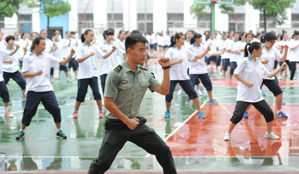 New girls get a lesson in combat