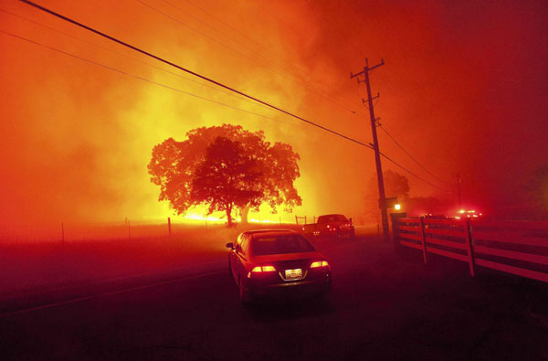 Fire rages through California park