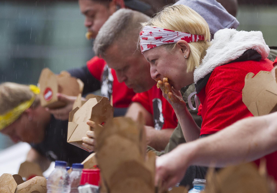 Eating champion gobbles 48 boxes of poutine