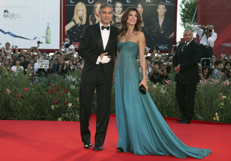 George Clooney and his girlfriend on red carpet at 66th Venice Film Festival