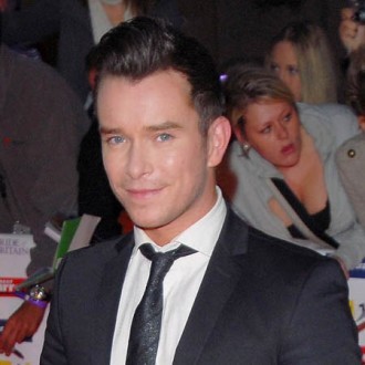 Stephen Gately's partner escapes to London