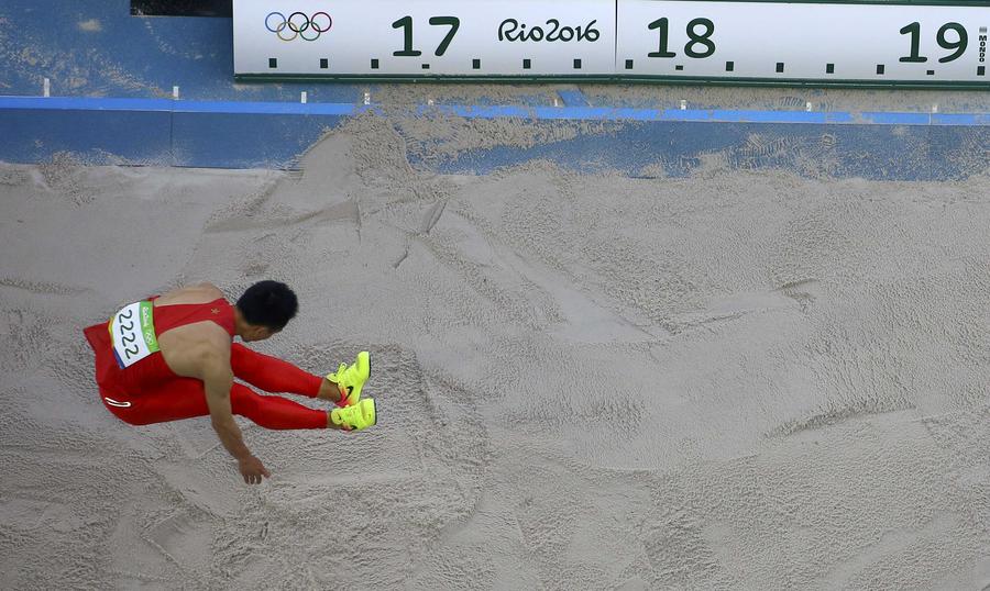 China's Dong Bin wins triple jump bronze