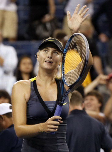 Sharapova shifts up a gear to reach third round