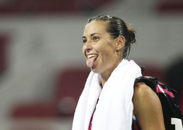 Gritty Pennetta shocks Wozniacki to reach China Open semis