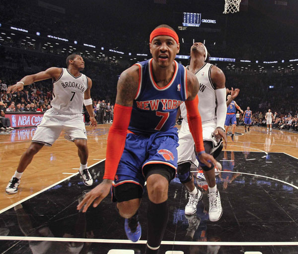 Sizzling Melo lifts Knicks over Nets, 100-97