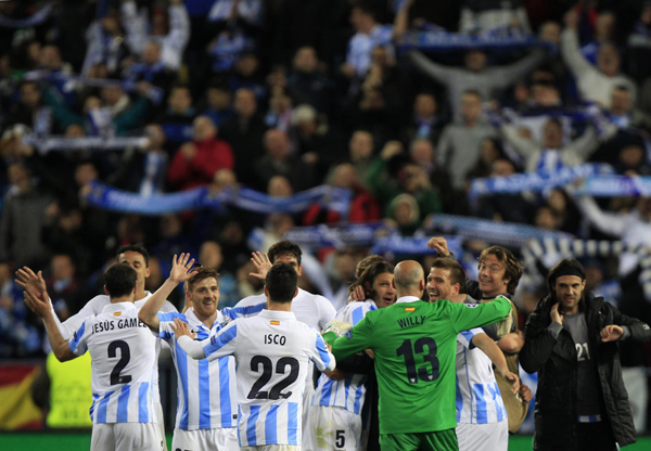 Malaga defies debts to join Euro elite