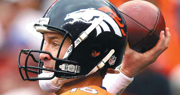 Manning sets TD record