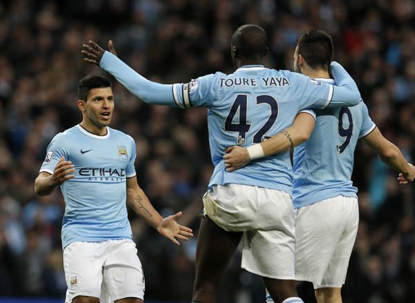 Man City hit six past hapless Spurs, United held