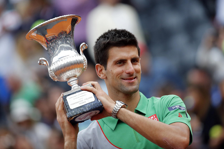 Djokovic, Serena Williams take Italian Open titles