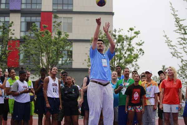 Yao Ming makes a big impression at Youth Olympic Village