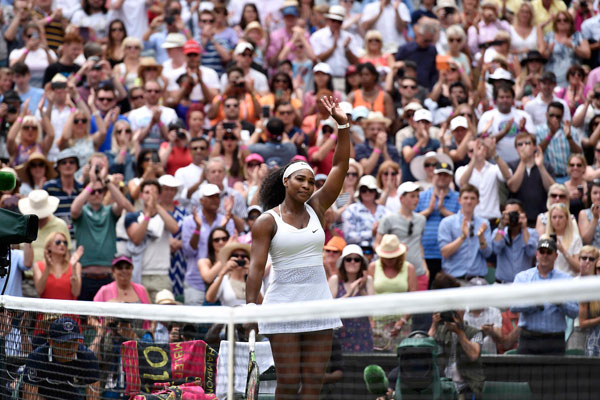 Serena Williams beats sister Venus to reach last eight