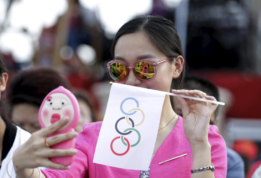 Chinese celebrate Beijing's win