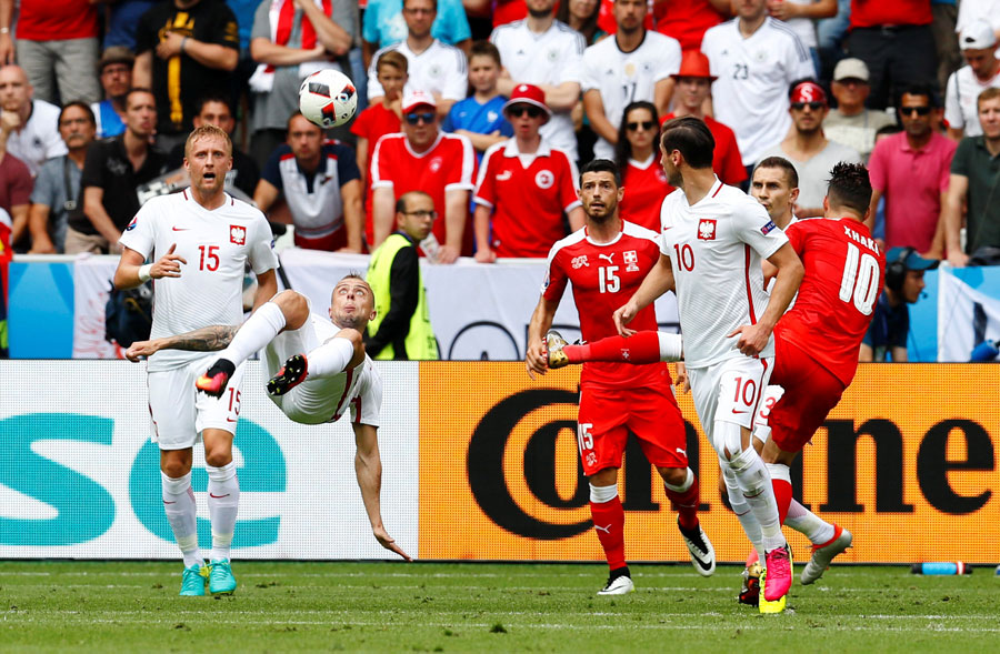 Red Dragon roars, Poland makes history, Quaresma saves Portugal