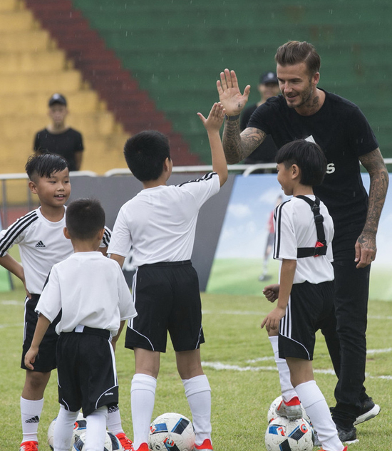 David Beckham promotes football in South China school