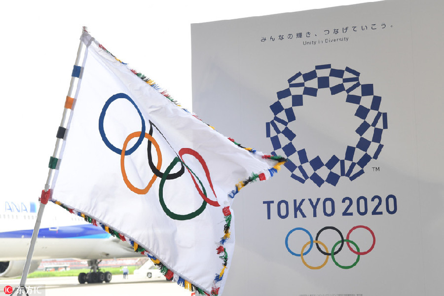 Tokyo welcomes the Olympic flag