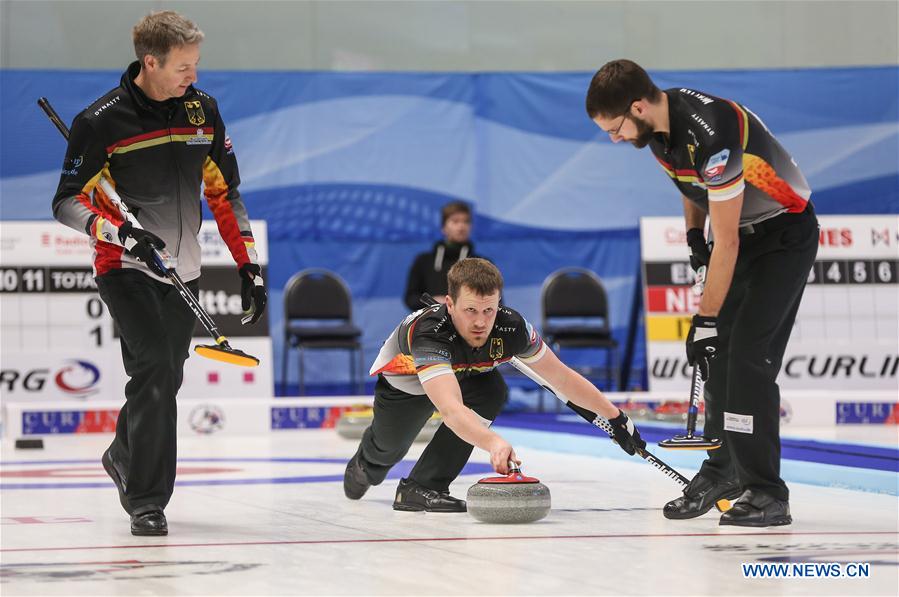 China beats Germany 7-4 in men's curling Olympic qualification