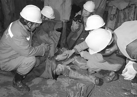 Workers rescued from collapsed rail tunnel