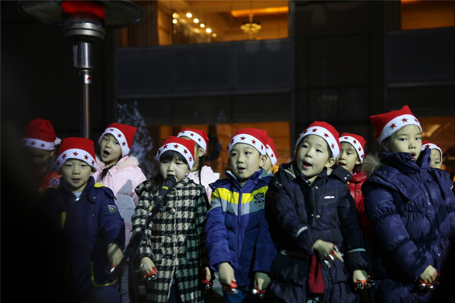 Beijing gets into Christmas spirit with illuminated trees, carols and the smell of cinnamon