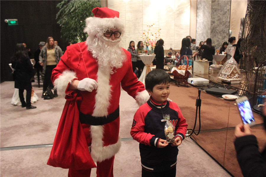 Beijing gets into Christmas spirit with illuminated trees, carols and the smell of cinnamon