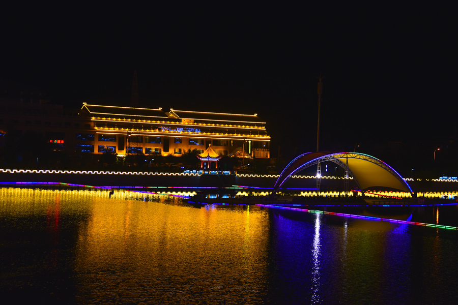 Vibrant night cityscape of Gansu's Dunhuang city