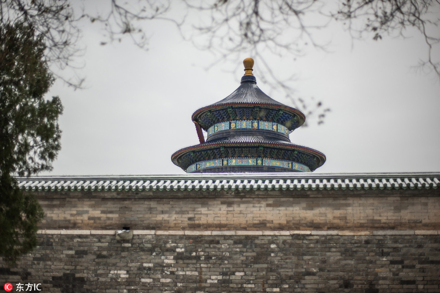 Season’s first snow meets the Temple of Heaven