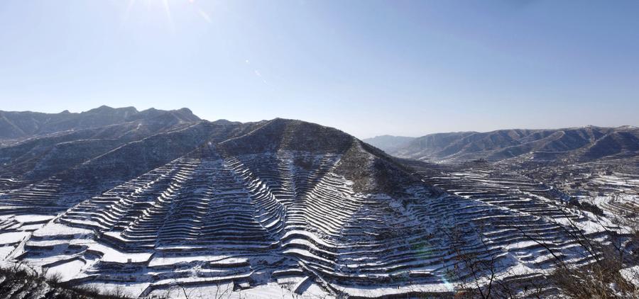 Scenery of terraced fields after snow in Hebei