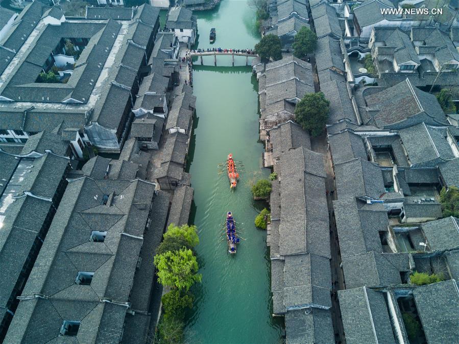 Boat competition held to celebrate Sanyuesan Festival in E China