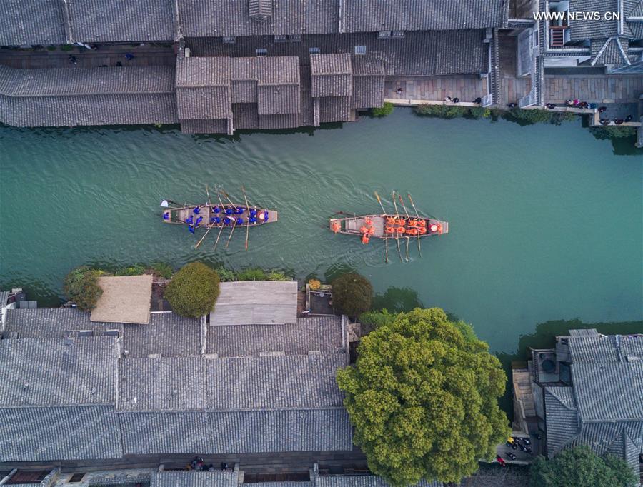 Boat competition held to celebrate Sanyuesan Festival in E China