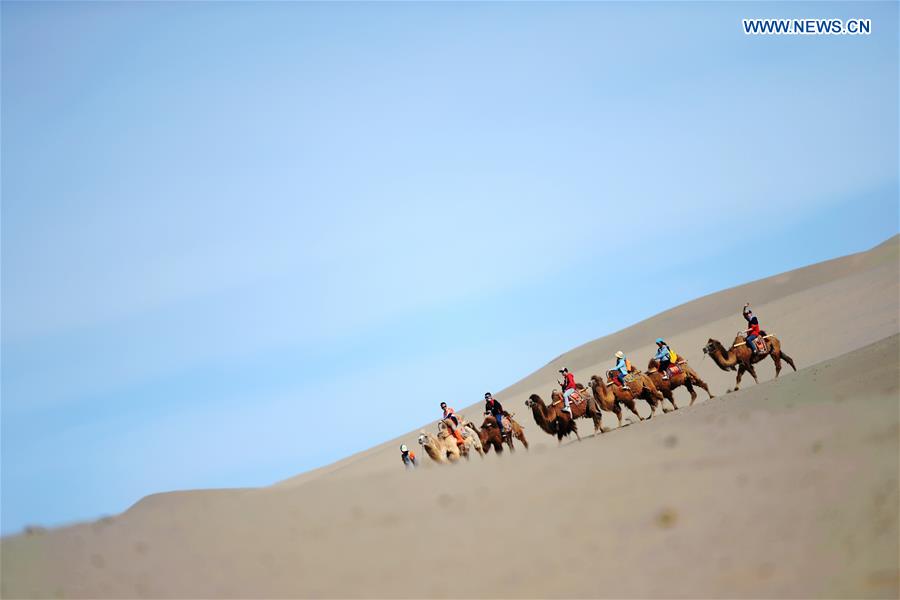 Mingsha Sand Mountain scenery zone in Dunhuang attracts tourists