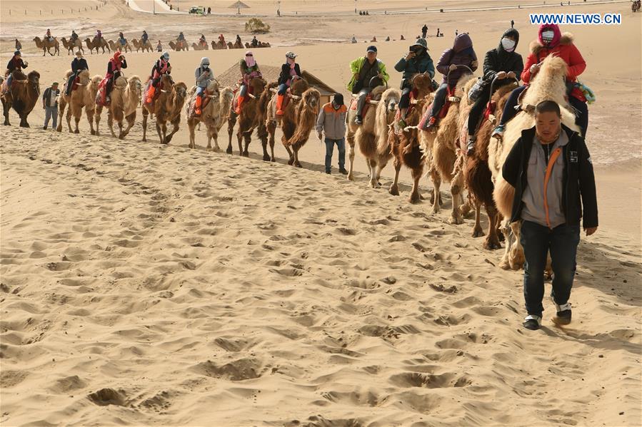 Mingsha Sand Mountain scenery zone in Dunhuang attracts tourists