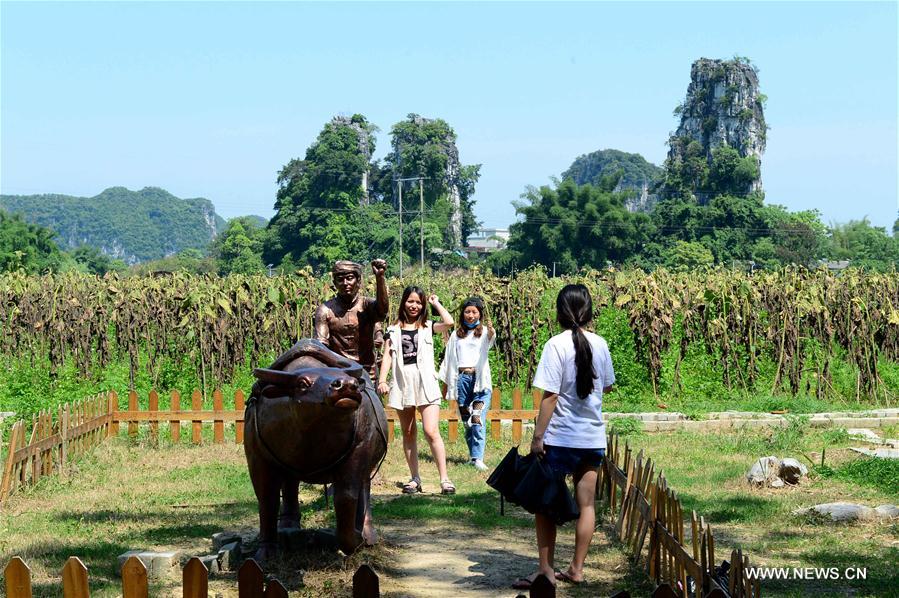 Rural tourism in Guangxi helps to boost economy with karst landform