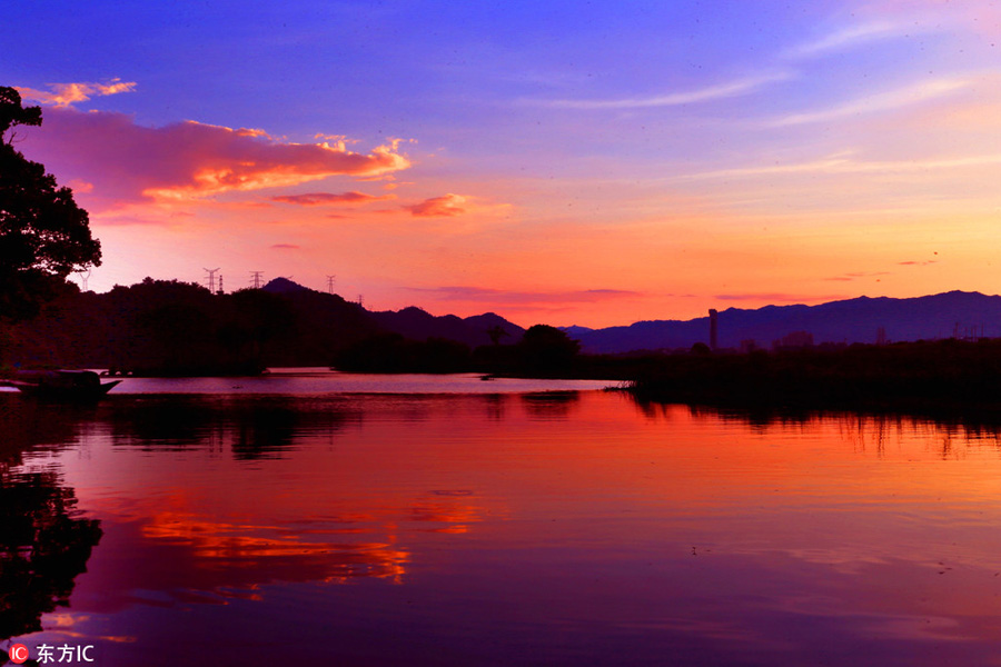 Beautiful Zhejiang village under colorful sunset glow