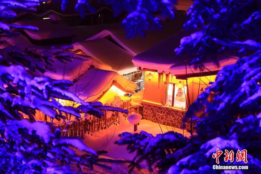 A nighttime winter wonderland in China's snow town