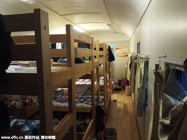 Students sleep in retired train