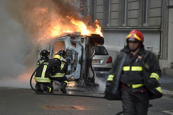 Italy opposition calls for minister to go after Expo riots