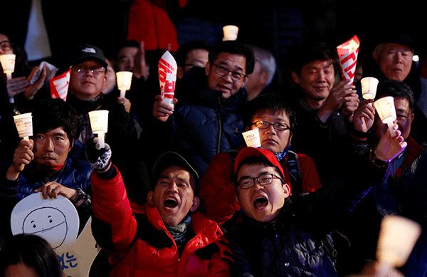 South Korean president sees approval rating fall further on confidante scandal