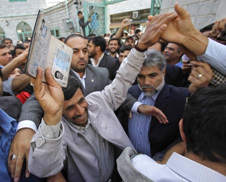 Iran's Ahmadinejad, rival both claim election win