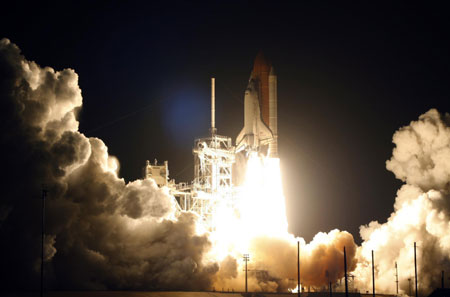 US shuttle Discovery lifts off after two delays