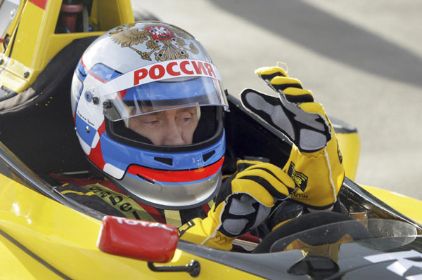 Putin roars off in F1 race car