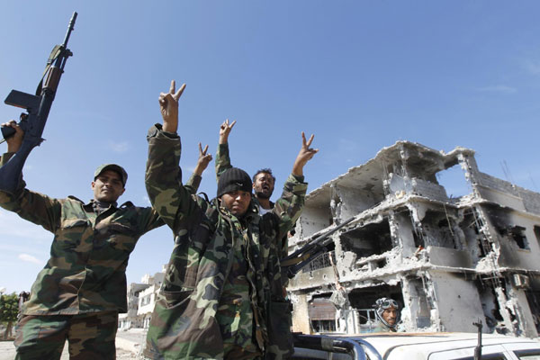 Gadhafi killed as Libya's revolt claims hometown