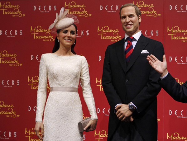 Wax figures of UK Prince William and Catherine