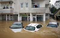 Flooding threatens Serbia power plants, 37 dead