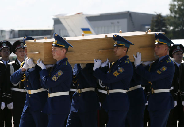 Plane with MH17 bodies en route to Netherlands