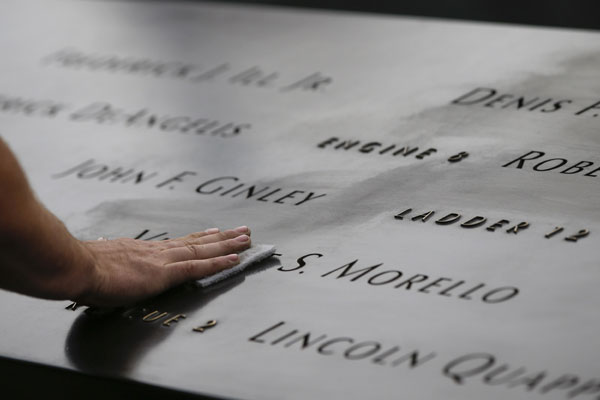 Americans mark the 13th anniversary of the 9/11 attacks