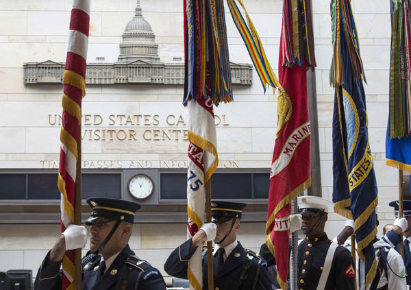 Americans mark the 13th anniversary of the 9/11 attacks