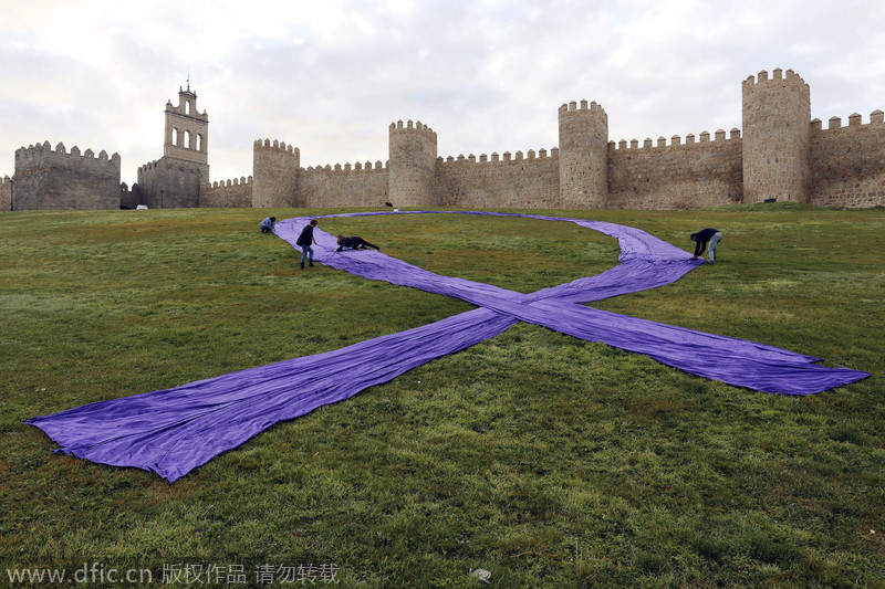 Protesters rally against violence to women